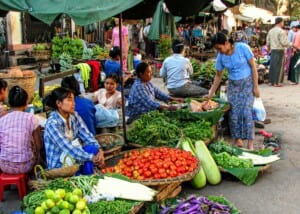 Photo of a thriving produce market in Bagan, Myanmar