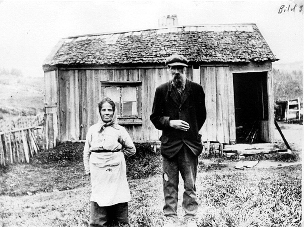 A Old Man and Woman in Front of a Hut in Rural Sweden